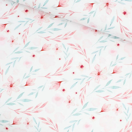 Jersey Stoff Blumenparadies mit zartrosa und blauen Blumen auf weißem Hintergrund – ideal für Baby- und Kinderkleidung