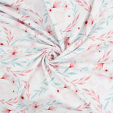 Kinderstoff Jersey in Weiß mit romantischem Blumenprint in Pastellfarben – OEKO-TEX zertifiziert