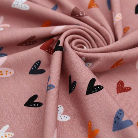 Jersey Meterware bunte Herzen auf Rosa