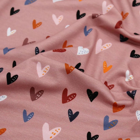 Weicher Jersey bunte Herzen auf Rosa