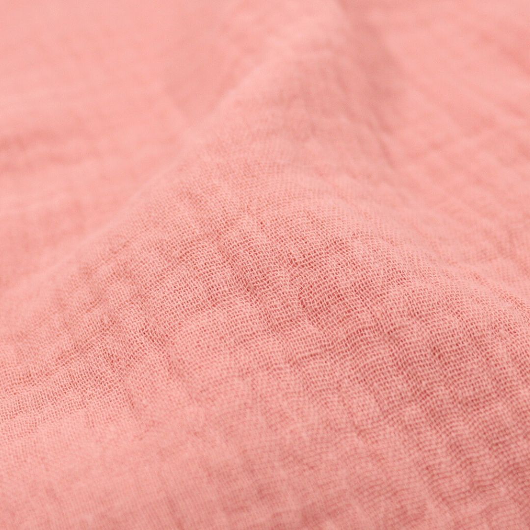 Musselin in Korallenrosa – ideal für Kleidung und Babytücher