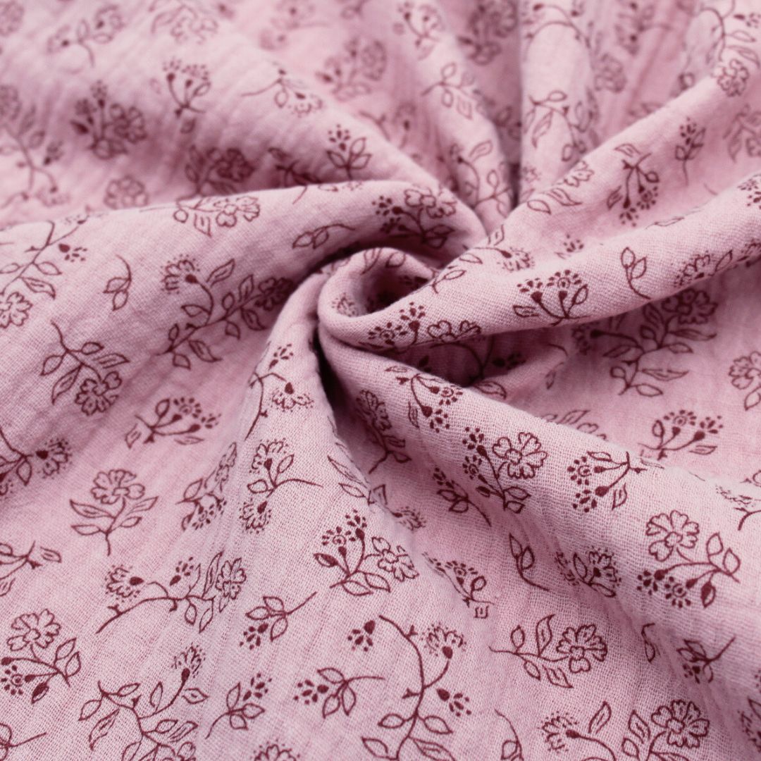 Musselinstoff in Mauve mit floralen Motiven – ideal für Kleider, Blusen und Schals.