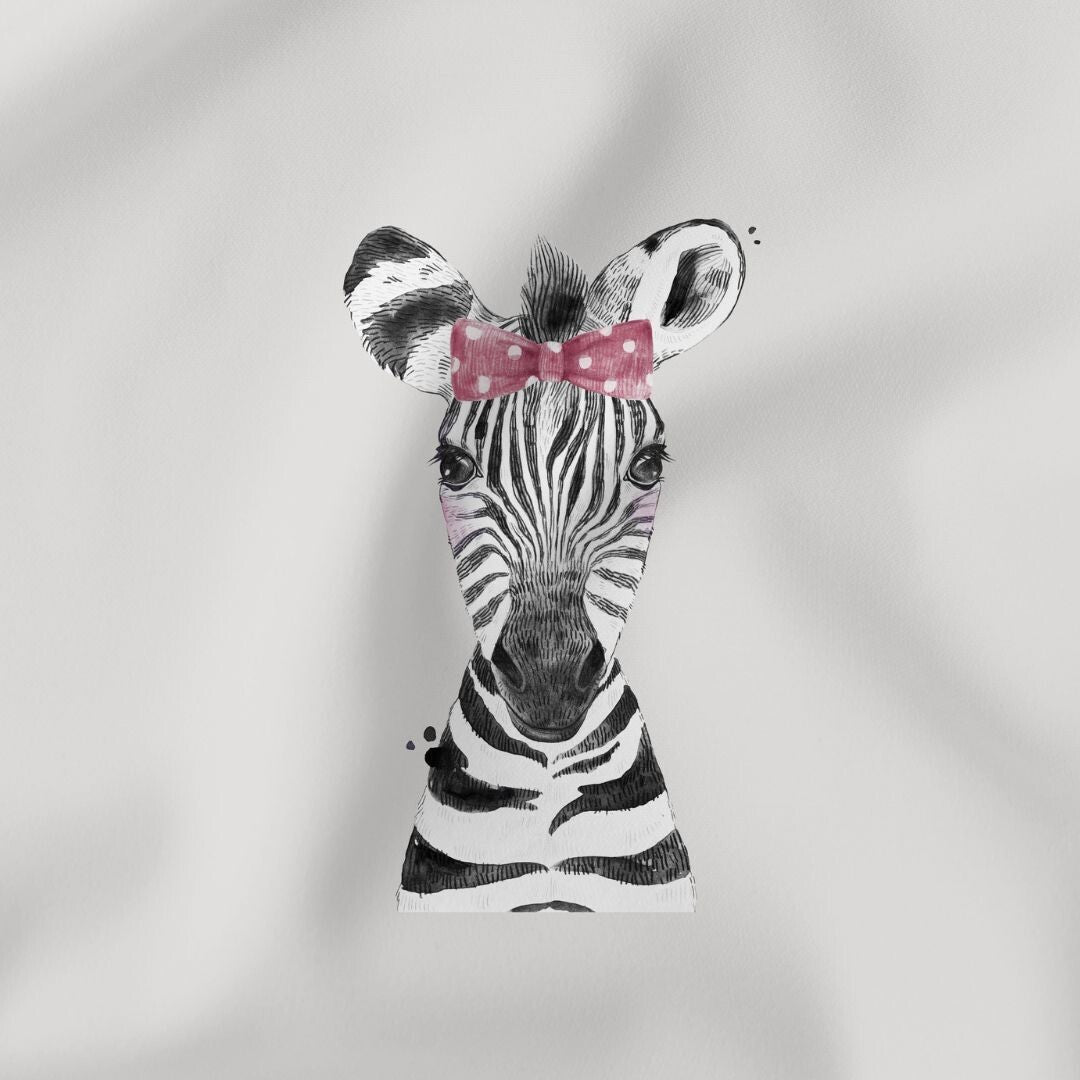 Weiches Jersey Panel mit Zebra-Motiv und rosa Schleife auf grauem Hintergrund für Kinderkleidung.