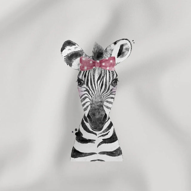 Weiches Jersey Panel mit Zebra-Motiv und rosa Schleife auf grauem Hintergrund für Kinderkleidung.