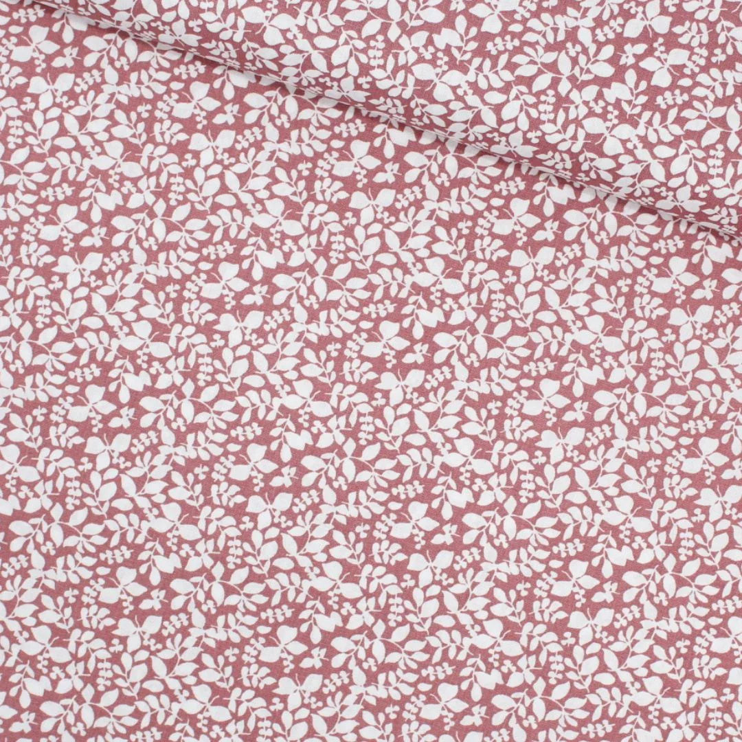 Baumwollpopeline mit kleinen Blättern in Mauve, ideal für Nähprojekte wie Babydecken, Kissenbezüge und Turnbeutel.