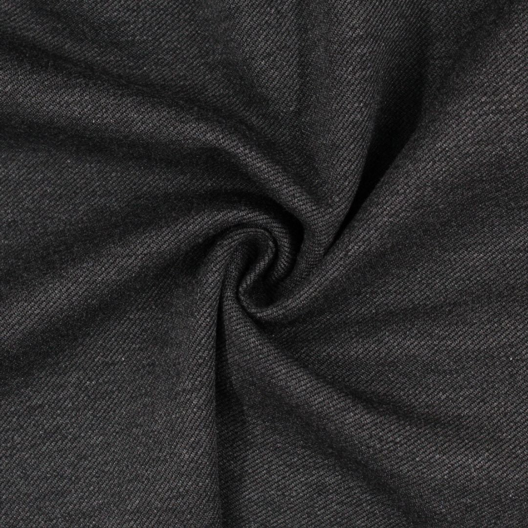 Punta Twill Stoff ausgebreitet, zeigt die elastische und schwere Qualität
