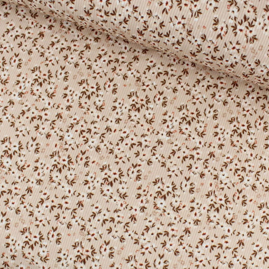 Rippenjersey beige mit kleinen weißen Blumen – elastischer Baumwolljersey mit feiner Rippenstruktur, ideal für Kleidung und Kinderstoffe.