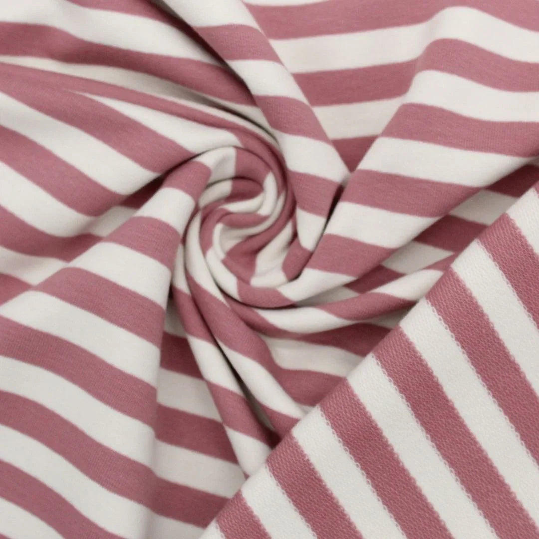 Hochwertiger French Terry Stoff mit rosa Streifen – atmungsaktiv, elastisch und perfekt für kreative Familienprojekte.