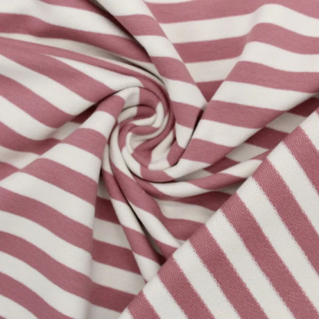 Hochwertiger French Terry Stoff mit rosa Streifen – atmungsaktiv, elastisch und perfekt für kreative Familienprojekte.