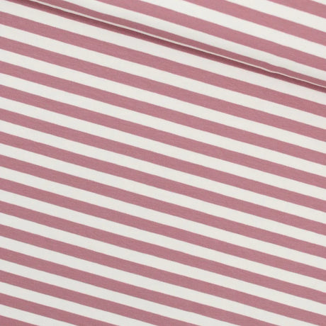 Nahaufnahme des French Terry Stoffes mit zarten rosa Streifen auf einer weichen und elastischen Oberfläche, ideal für bequeme Kleidung.