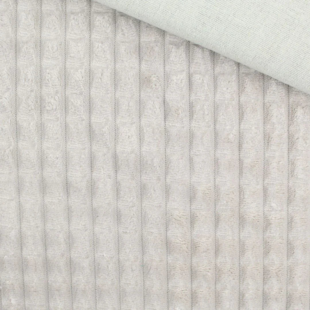 Nahaufnahme vom Velour Polsterstoff in Sand mit Quadratten-Muster