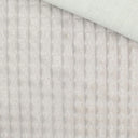 Nahaufnahme vom Velour Polsterstoff in Sand mit Quadratten-Muster