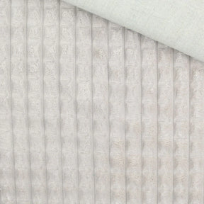 Nahaufnahme vom Velour Polsterstoff in Sand mit Quadratten-Muster
