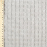 Stoffdetail: Weiche Cord-Optik des beigen Velour Polsterstoffs