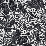 Viskose-Voile-Stoff in Schwarz-Weiß mit abstraktem Muster, perfekt für die Herstellung von Strandkleidern, Blusen und Röcken. Stoffball