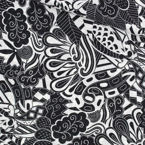 Viskose-Voile-Stoff in Schwarz-Weiß mit abstraktem Muster, perfekt für die Herstellung von Strandkleidern, Blusen und Röcken. Stoffball