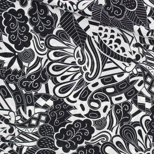 Viskose-Voile-Stoff in Schwarz-Weiß mit abstraktem Muster, perfekt für die Herstellung von Strandkleidern, Blusen und Röcken. Stoffball