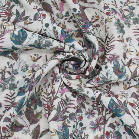 Weicher Viskosestoff "Blumenfeld" in lila und grün mit Blumenmuster, ideal für die Herstellung von Kleidern, Blusen und Röcken.