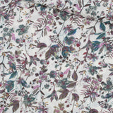 Weicher Viskosestoff "Blumenfeld" in lila und grün mit Blumenmuster, ideal für die Herstellung von Kleidern, Blusen und Röcken. Stoffball
