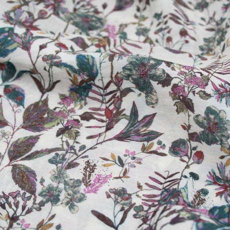 Weicher Viskosestoff "Blumenfeld" in lila und grün mit Blumenmuster, ideal für die Herstellung von Kleidern, Blusen und Röcken.