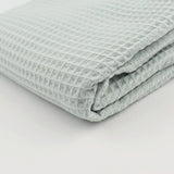 Leichter und hautfreundlicher Waffelstoff in Mintgrün – ideal für DIY-Nähprojekte und nachhaltige Textilien.