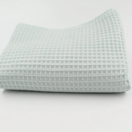 Leichter und hautfreundlicher Waffelstoff in Mintgrün – ideal für DIY-Nähprojekte und nachhaltige Textilien.