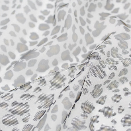 Weicher Tüll Leopardenmuster in Beige und Grau, ideal für Kleider und Kostüme.