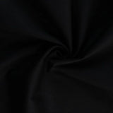 Hochwertige Baumwollpopeline in Schwarz – eleganter Stoff auf einem Schneiderpuppe drapiert.