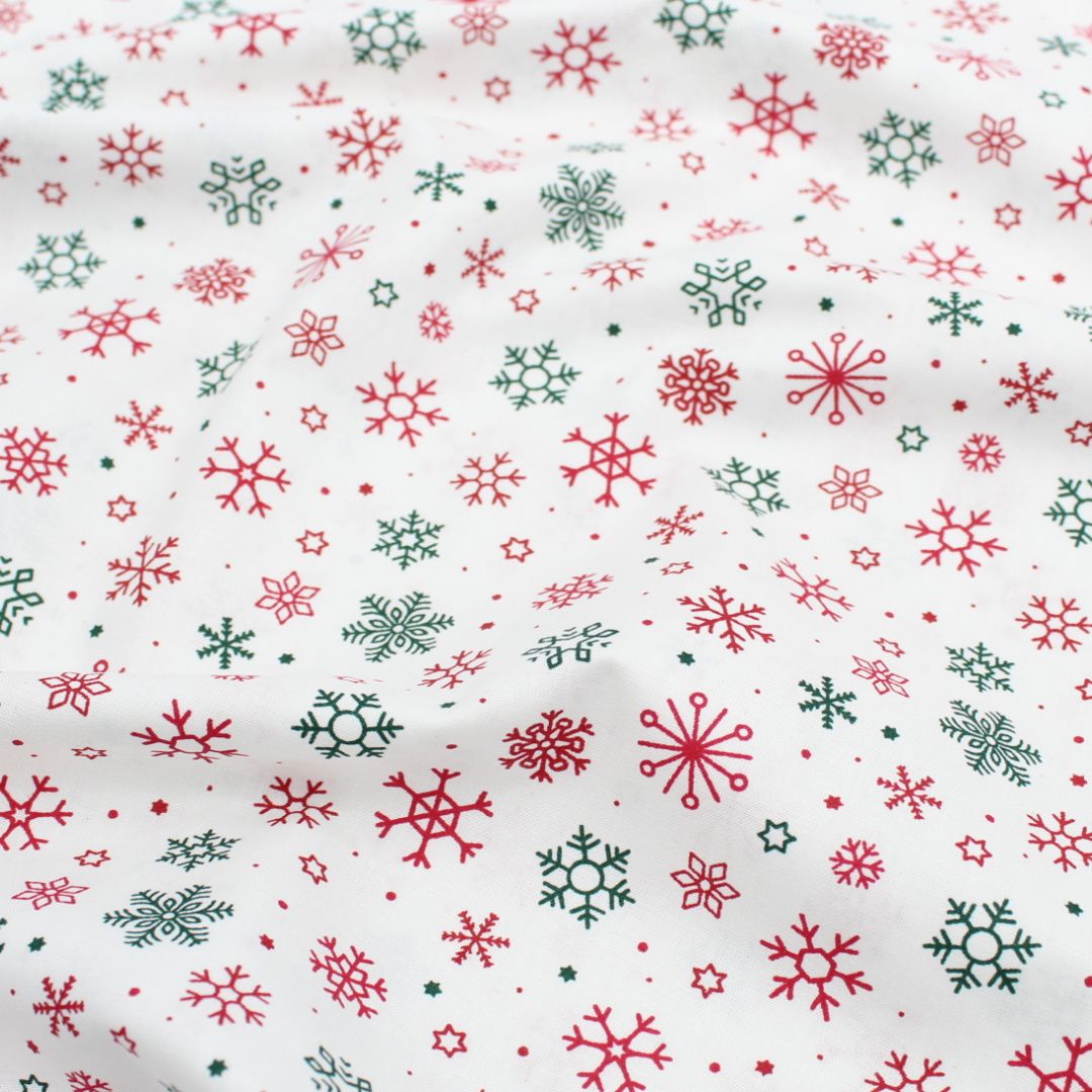 Popeline Stoff Weihnachtsstoff Schneeflocken und Sterne - Stofftime