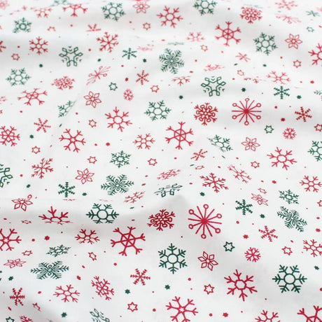 Popeline Stoff Weihnachtsstoff Schneeflocken und Sterne - Stofftime