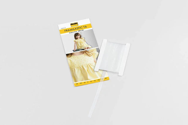 Vlieseline Framilastic T6 - elastisches Nähband in transparenter Ausführung, 6 mm breit und 5 m lang, ideal für dehnbare Kleidung und kreative Nähprojekte.