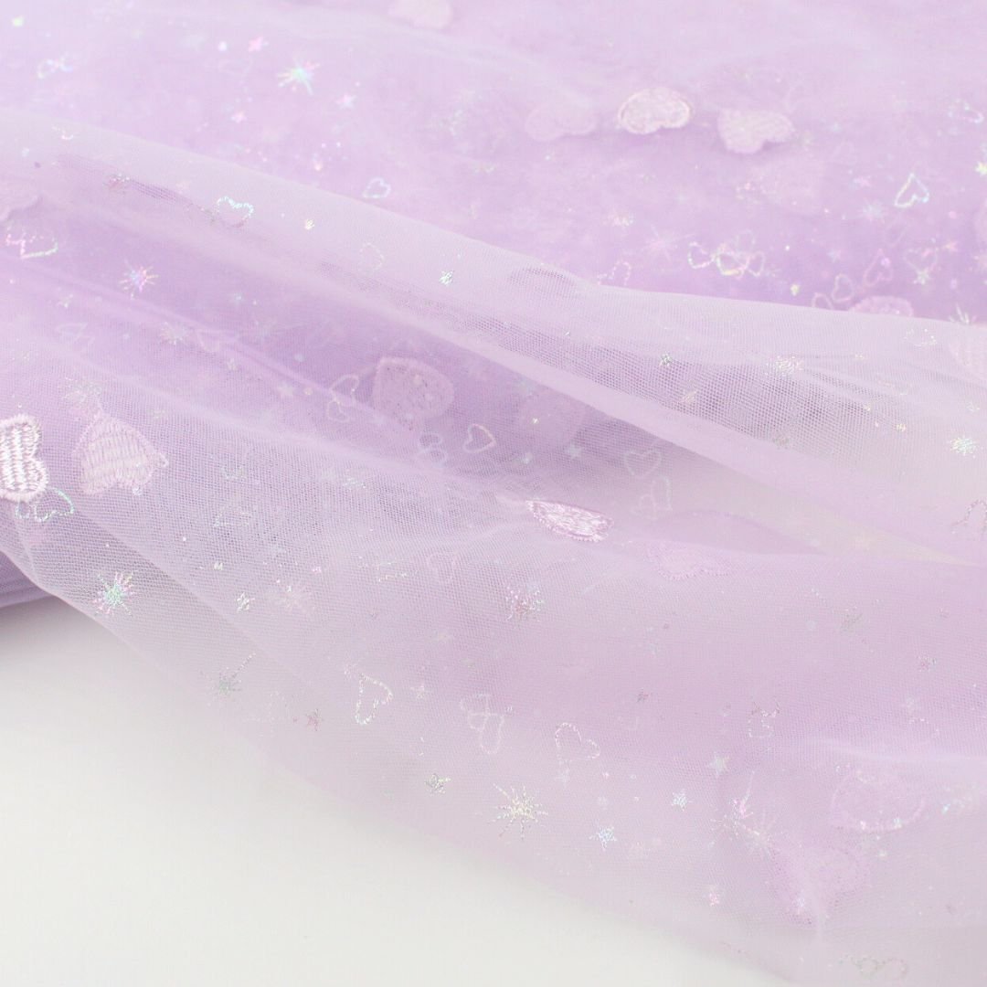 Tüllstoff mit gestickten Herzen und glitzernden Sternen - Stofftime