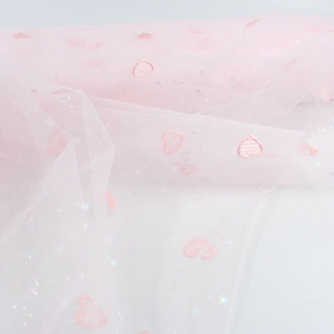 Tüllstoff mit gestickten Herzen und glitzernden Sternen - Stofftime