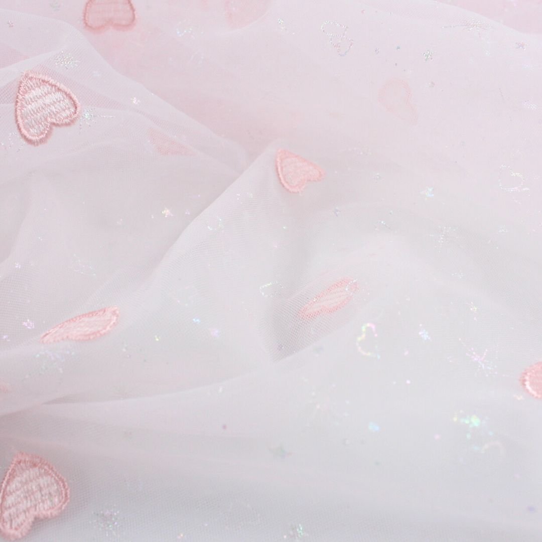 Tüllstoff mit gestickten Herzen und glitzernden Sternen - Stofftime