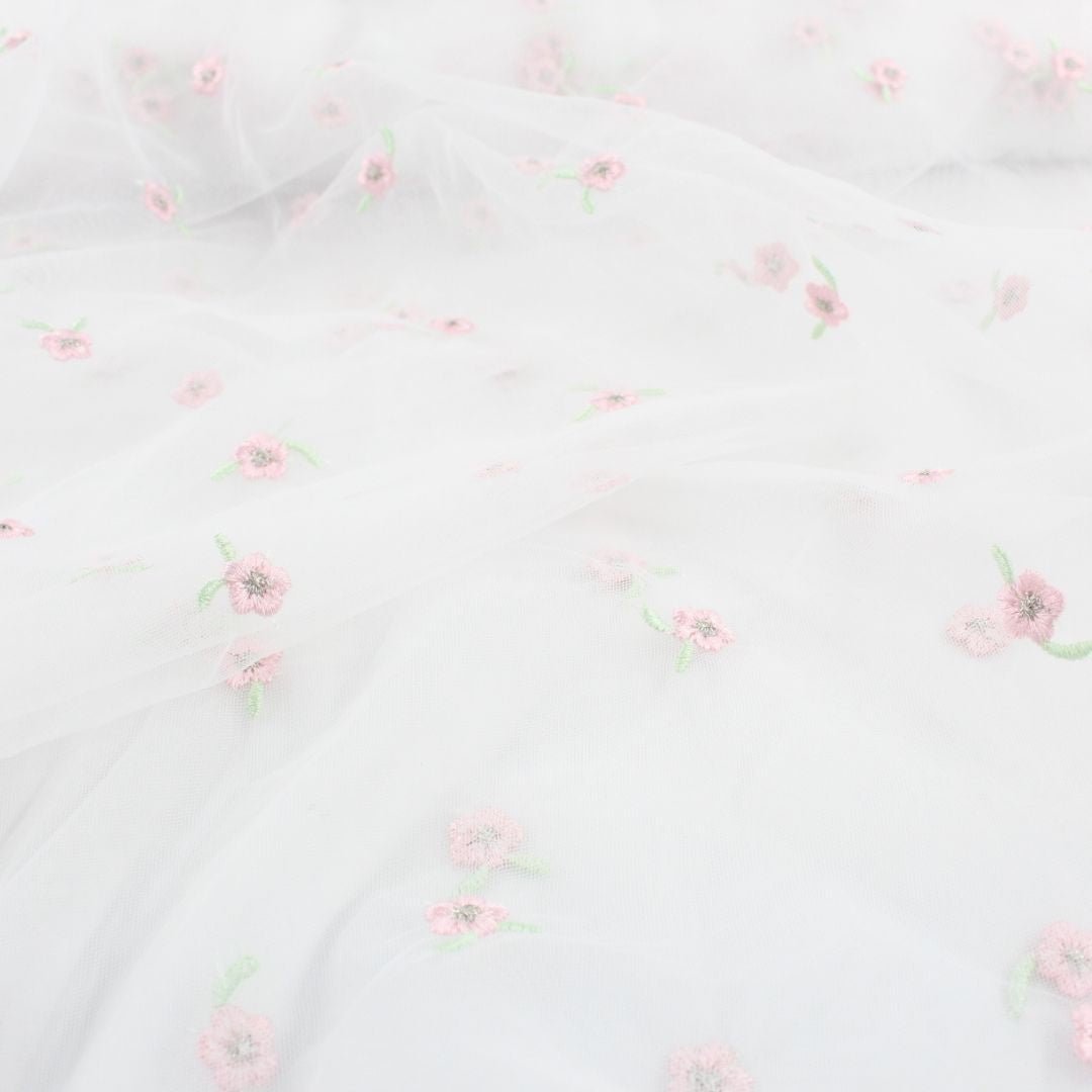 Tüllstoff mit gestickten rosa Blumen - Stofftime