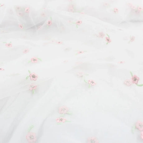Tüllstoff mit gestickten rosa Blumen - Stofftime