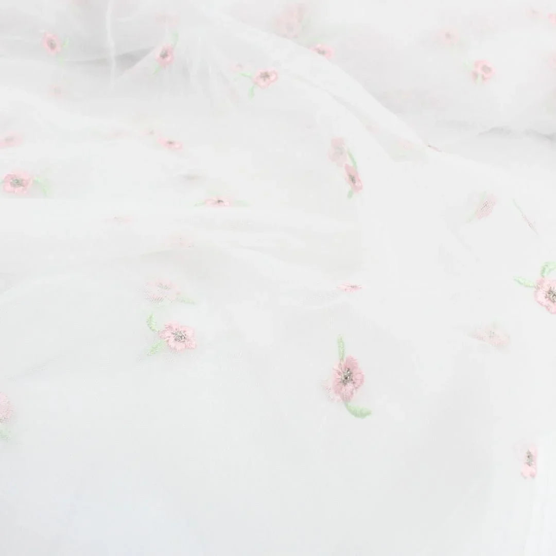 Tüllstoff mit gestickten rosa Blumen - Stofftime