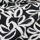 Viskose Nylon Weiße Blumen | Schwarz - Stofftime